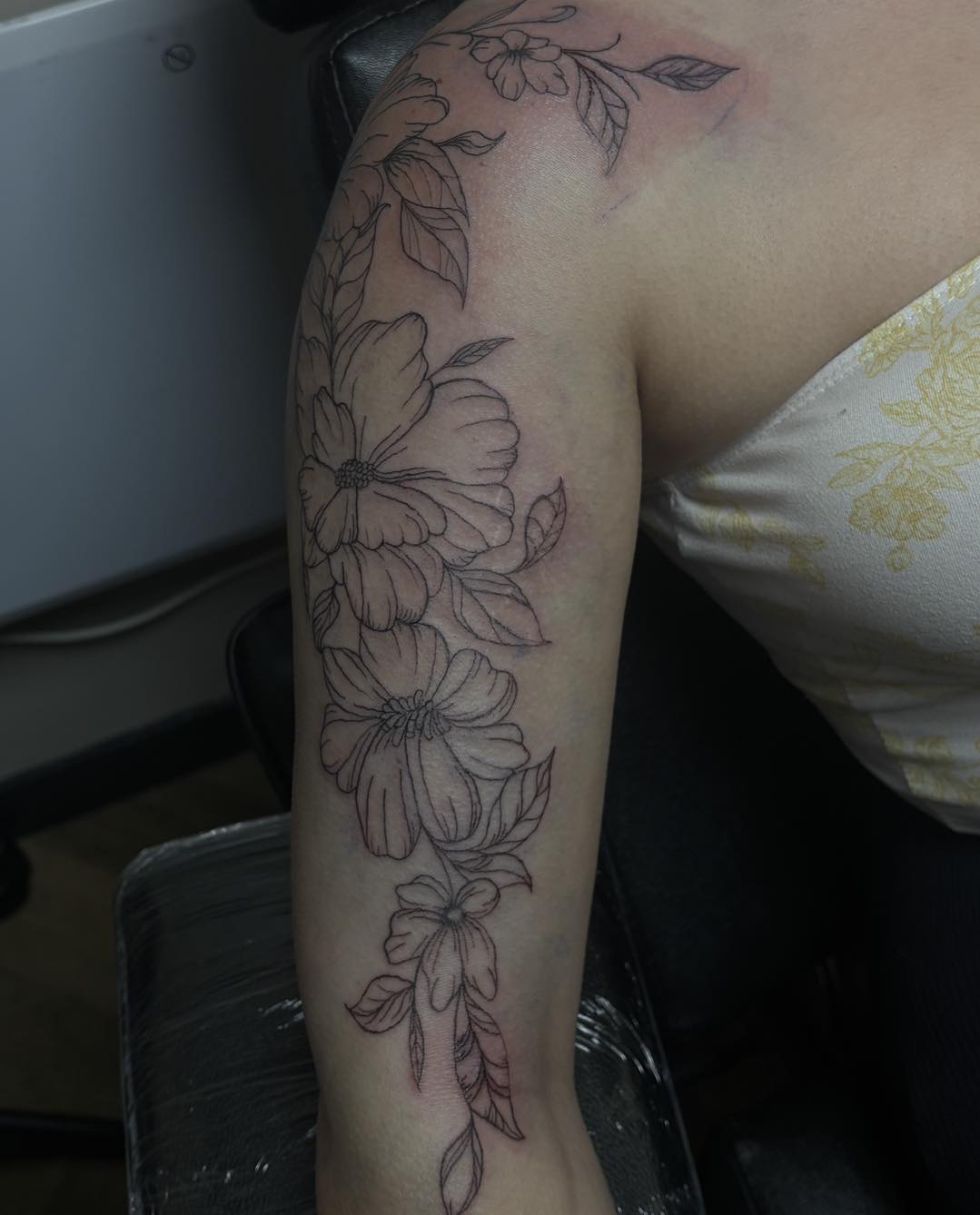 Fine line floral shoulder piece